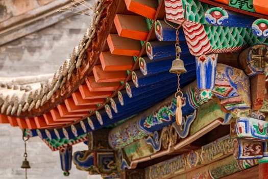 Ornate and colorful roofs with ornaments and spectacular decorations at Kumbum Jampaling Monastery, Xining, China