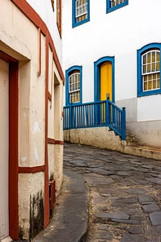 Street with cobblestones and houses with colonial architecture in the old and historic city of Diamantina in Minas Gerais, Brazil