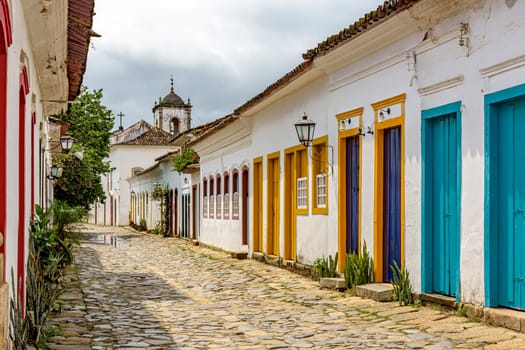Street of the old city of Paraty with its colorful colonial style houses in the state of Rio de Janeiro, Brazil