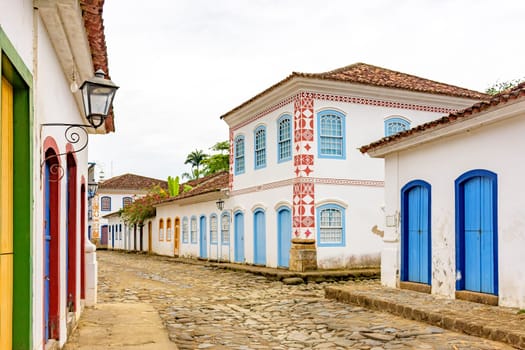 Streets of cobblestone and old houses in colonial style on the streets of the old and historic city of Paraty founded in the 17th century on the coast of the state of Rio de Janeiro, Brazil