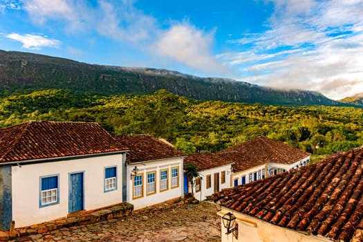 View of the old historic city of Tiradentes with its historic colonial-style houses and mountains in the background during the afternoon in Minas Gerais