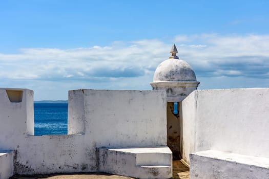 Walls and guardhouses of an old colonial fortress that was responsible for the defense of the city of Salvador in Bahia