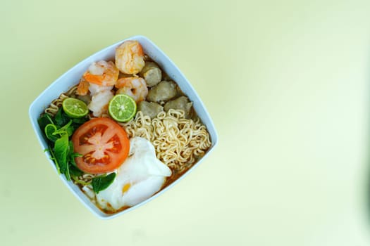 soto seger boyolali is a traditional beef soup with rice and sprouts served in a bowl.