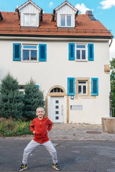 A little wriggles against the backdrop of a beautiful ancient historic building in Germany.