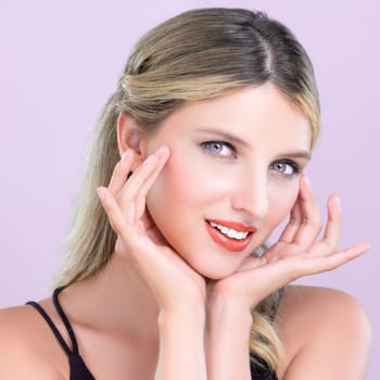 Closeup pretty beautiful woman with alluring perfect smooth and clean skin portrait in pink isolated background. Hand gesture with expressive facial expression for beauty model concept.