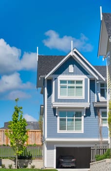 New residential townhouse on bright sunny day in Vancouver