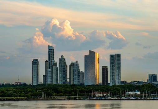 Large modern apartment buildings of Puerto Madero by the shoreline in Buenos Aires Argentina at sunset