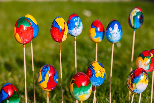 Poppy colorful Easter eggs with different colors uniquely hand-painted