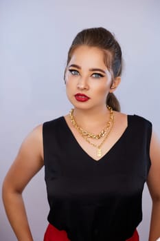 portrait shot of a young Ukrainian woman on the background, after make-up and hairstyle, for clothing advertising.