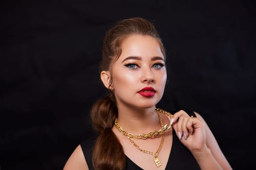 portrait shot of a young Ukrainian woman on the background, after make-up and hairstyle, for clothing advertising.