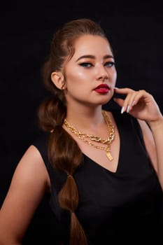 portrait shot of a young Ukrainian woman on the background, after make-up and hairstyle, for clothing advertising.