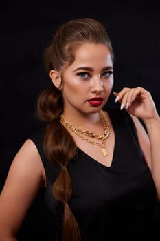 portrait shot of a young Ukrainian woman on the background, after make-up and hairstyle, for clothing advertising.