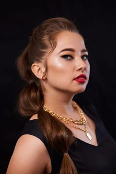 portrait shot of a young Ukrainian woman on the background, after make-up and hairstyle, for clothing advertising.