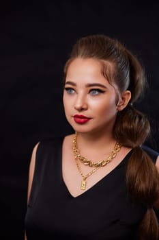 portrait shot of a young Ukrainian woman on the background, after make-up and hairstyle, for clothing advertising.