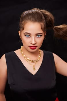 portrait shot of a young Ukrainian woman on the background, after make-up and hairstyle, for clothing advertising.