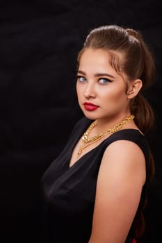 portrait shot of a young Ukrainian woman on the background, after make-up and hairstyle, for clothing advertising.