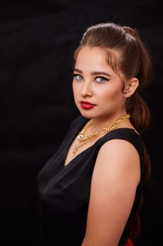 portrait shot of a young Ukrainian woman on the background, after make-up and hairstyle, for clothing advertising.