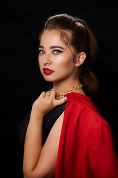 portrait shot of a young Ukrainian woman on the background, after make-up and hairstyle, for clothing advertising.