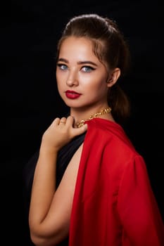 portrait shot of a young Ukrainian woman on the background, after make-up and hairstyle, for clothing advertising.