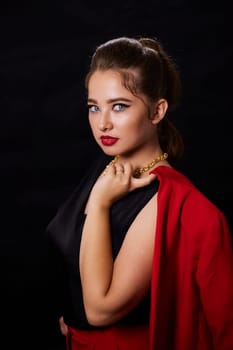 portrait shot of a young Ukrainian woman on the background, after make-up and hairstyle, for clothing advertising.