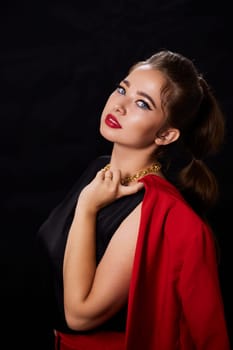 portrait shot of a young Ukrainian woman on the background, after make-up and hairstyle, for clothing advertising.