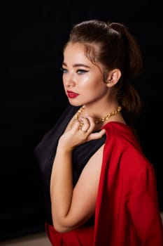 portrait shot of a young Ukrainian woman on the background, after make-up and hairstyle, for clothing advertising.