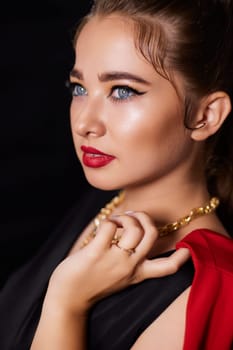 portrait shot of a young Ukrainian woman on the background, after make-up and hairstyle, for clothing advertising.