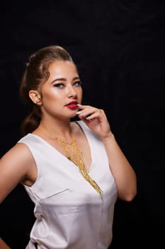 portrait shot of a young Ukrainian woman on the background, after make-up and hairstyle, for clothing advertising.