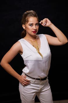 portrait shot of a young Ukrainian woman on the background, after make-up and hairstyle, for clothing advertising.