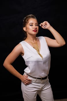 portrait shot of a young Ukrainian woman on the background, after make-up and hairstyle, for clothing advertising.