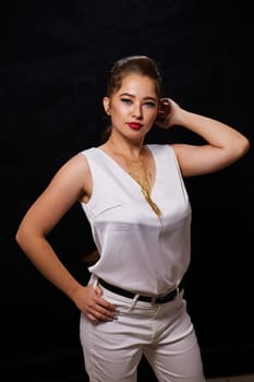 portrait shot of a young Ukrainian woman on the background, after make-up and hairstyle, for clothing advertising.