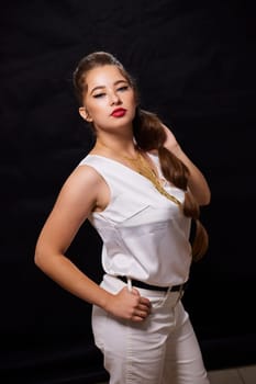 portrait shot of a young Ukrainian woman on the background, after make-up and hairstyle, for clothing advertising.