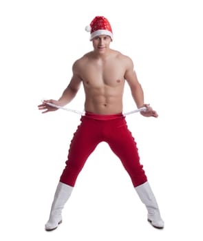 Full length portrait of sexy dancer in christmas costume. Isolated on white