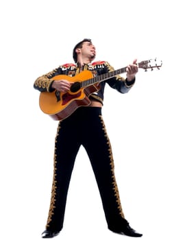 Full length portrait of toreador playing guitar. Isolated on white