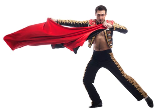 Full length portrait of handsome toreador in black costume black costume with red cloth. Isolated on white
