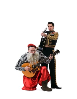 Old man and toreador playing guitars. Isolated on white