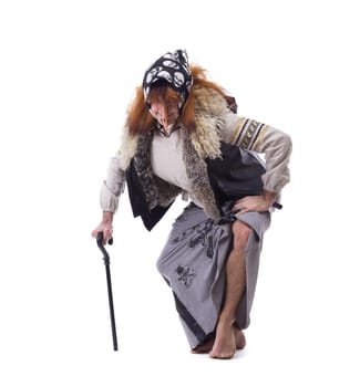 Baba Yaga in old clothes. Isolated on white