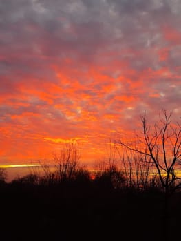 Red dawn in the city on a winter morning.