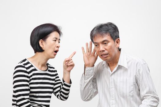 woman pointing her finger against and blame her husband