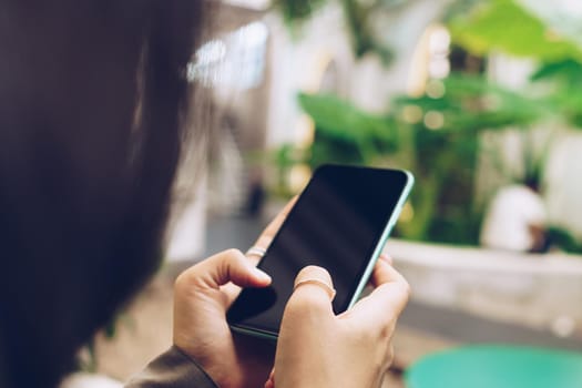 Woman hand using smartphone to do work business, social network, communication concept.