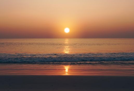 Tropical nature clean beach sunset sky time with sun light background.