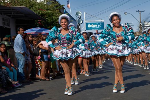 ARICA, CHILE - JANUARY 22, 2016: Caporales dance group performing at the annual Carnaval Andino con la Fuerza del Sol in Arica, Chile.