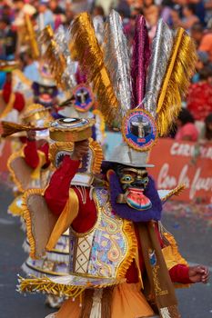 Arica, Chile - January 23, 2016: Morenada dance group performing a traditional ritual dance as part of the Carnaval Andino con la Fuerza del Sol in Arica, Chile.