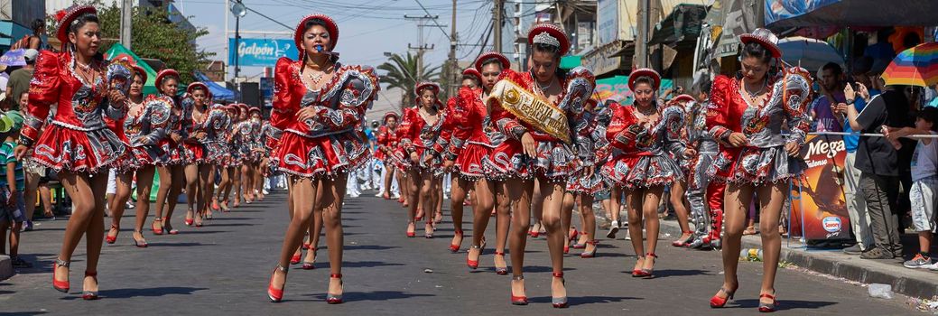 ARICA, CHILE - JANUARY 22, 2016: Caporales dance group performing at the annual Carnaval Andino con la Fuerza del Sol in Arica, Chile.