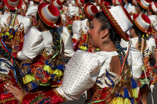 ARICA, CHILE - JANUARY 22, 2016: Caporales dance group performing at the annual Carnaval Andino con la Fuerza del Sol in Arica, Chile.