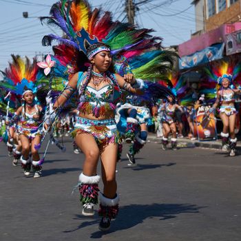 Arica, Chile - January 23, 2016: Tobas dancers in traditional Andean costume performing at the annual Carnaval Andino con la Fuerza del Sol in Arica, Chile.