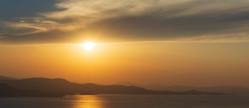 Beautiful sunset over the Aegean Sea in Pelion Peninsula, Greece.