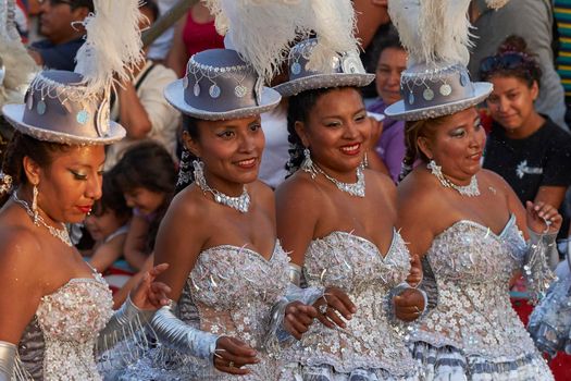 Arica, Chile - January 23, 2016: Morenada dance group performing a traditional ritual dance as part of the Carnaval Andino con la Fuerza del Sol in Arica, Chile.