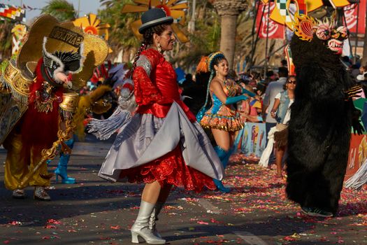 Arica, Chile - January 23, 2016: Morenada dance group performing a traditional ritual dance as part of the Carnaval Andino con la Fuerza del Sol in Arica, Chile.