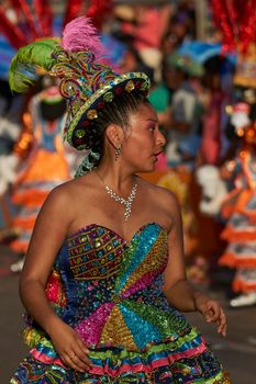 Arica, Chile - January 23, 2016: Morenada dance group performing a traditional ritual dance as part of the Carnaval Andino con la Fuerza del Sol in Arica, Chile.